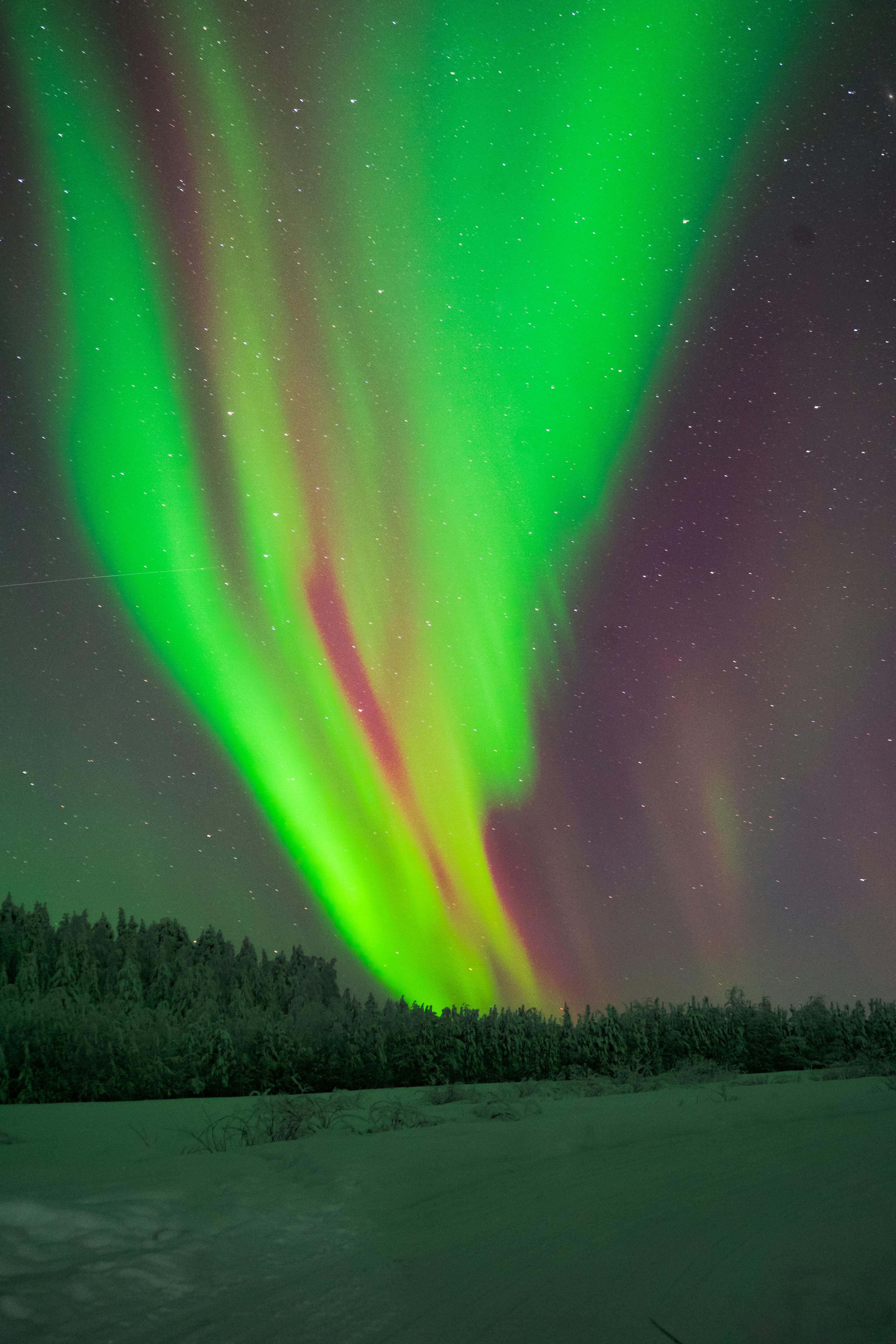 Dramatic northern lights aurora borealis Finland